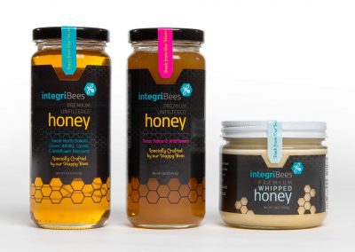integriBees North Dakota & Texas Liquid Honeys in jars and North Dakota Whipped Honey in jar